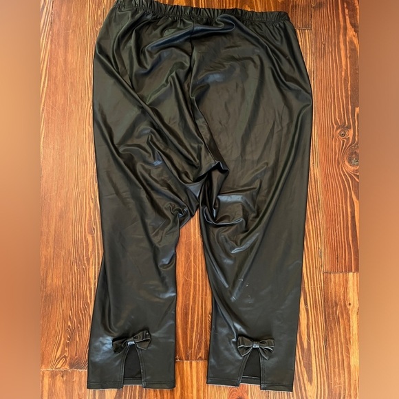 TORRID Faux Leather Black Cropped Leggings Bow Accents On Back - Picture 6 of 10